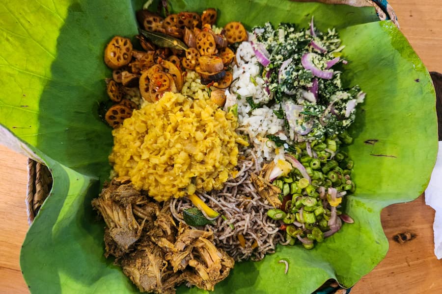 A Sri Lankan rice and curry meal served on a banana leaf